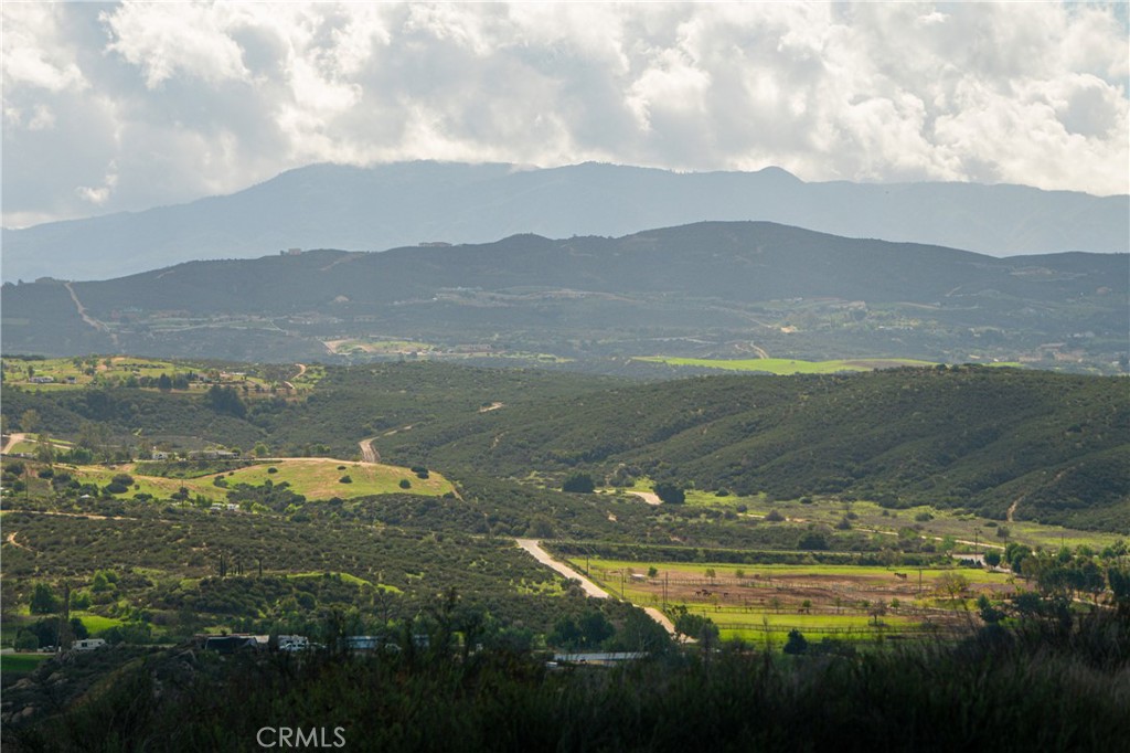 40105 Voyager Road Hemet, CA 92544 - Photo 22 of 27 a view of lake with mountain