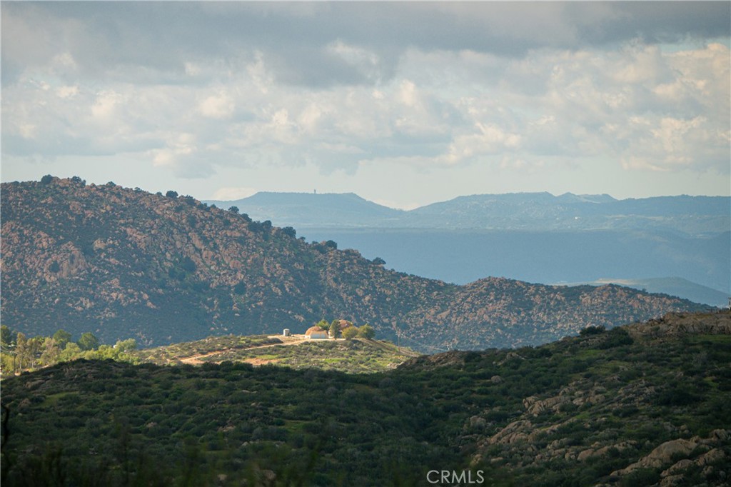 40105 Voyager Road Hemet, CA 92544 - Photo 24 of 27 a view of mountains and valleys in the background