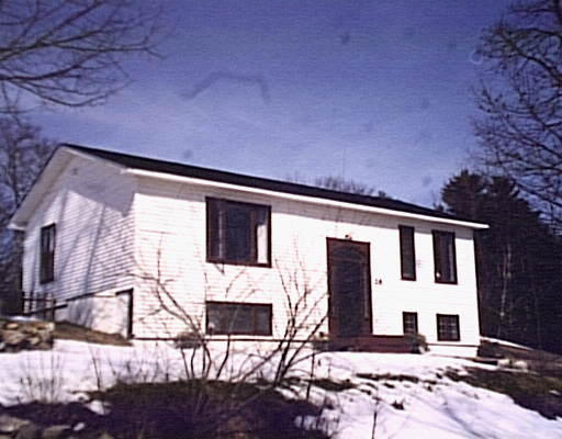 26 Lebel Road Rowley, MA 01969 - Photo 1 of 1 a front view of a house with large windows