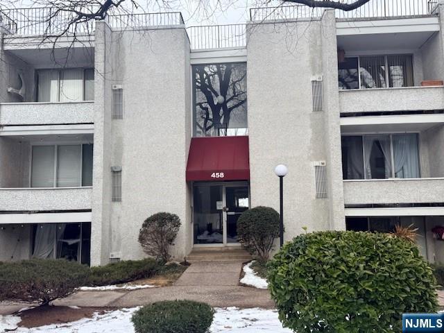 458 River Road Nutley, NJ 07110 - Photo 13 of 13 a front view of a house with patio