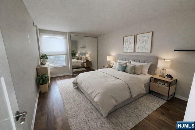 458 River Road Nutley, NJ 07110 - Photo 15 of 15 a bedroom with a bed and wooden floor