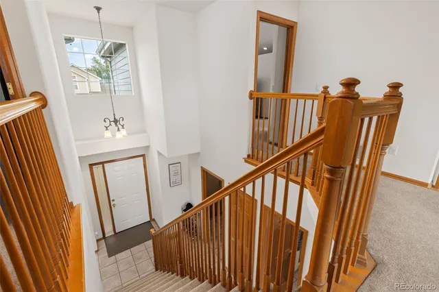 a view of stairs and with windows