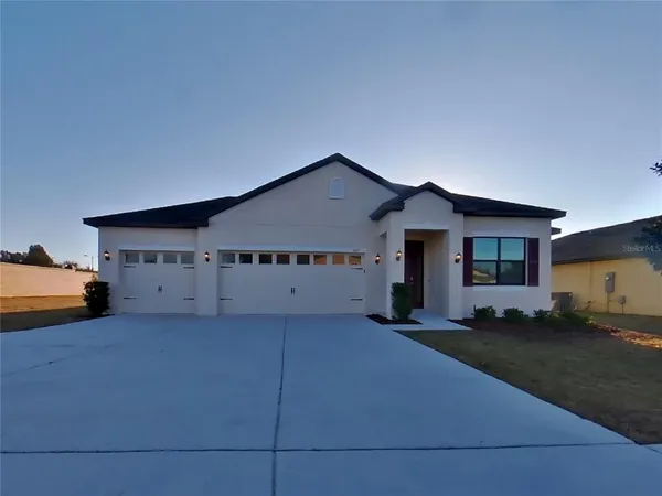a house view with a outdoor space