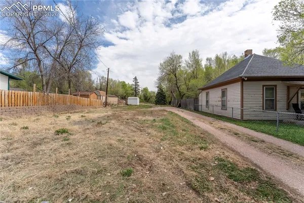 a view of backyard with green space