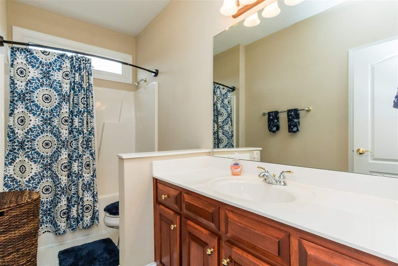 107 Austin Pond Road Clayton, NC 27520 - Photo 16 of 24 Guest bathroom with transom