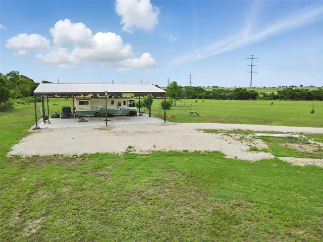 a view of a lake with a big yard