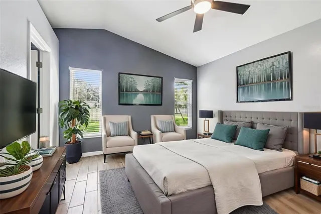 a bathroom with a double vanity sink and a bathtub