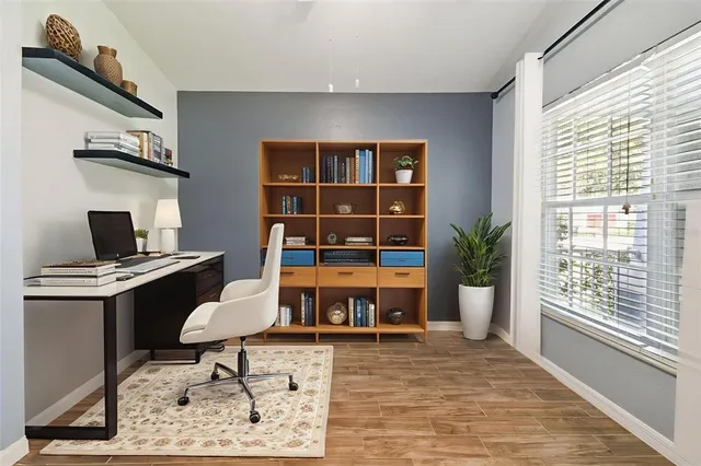 a view of a kitchen with a sink and cabinet