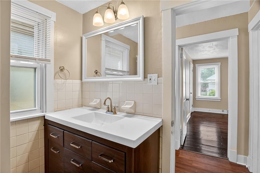 924 1st Coraopolis, PA 15108 - Photo 19 of 34 a bathroom with a sink and a mirror