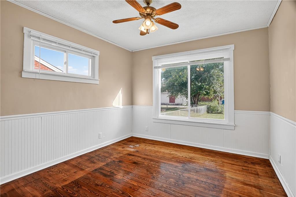 924 1st Coraopolis, PA 15108 - Photo 7 of 34 a view of an empty room with wooden floor and a window