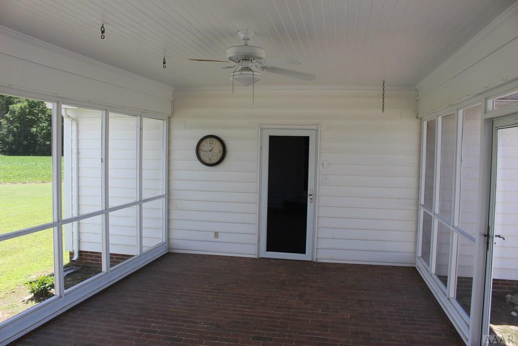 186 Willis Hare Road Pendleton, NC 27862 - Photo 14 of 37 Screened Porch and breezeway to garage