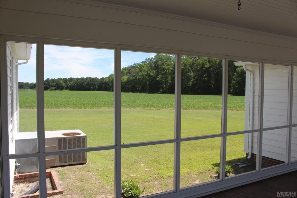 186 Willis Hare Road Pendleton, NC 27862 - Photo 16 of 37 Screened Porch and breezeway to garage