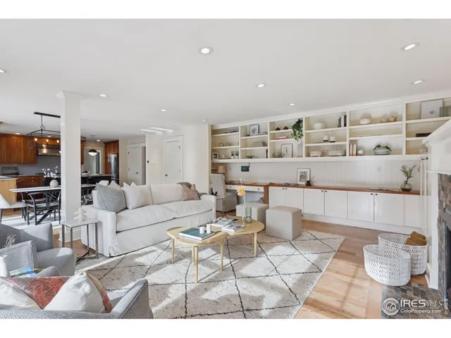 a bedroom with a bed and a potted plant