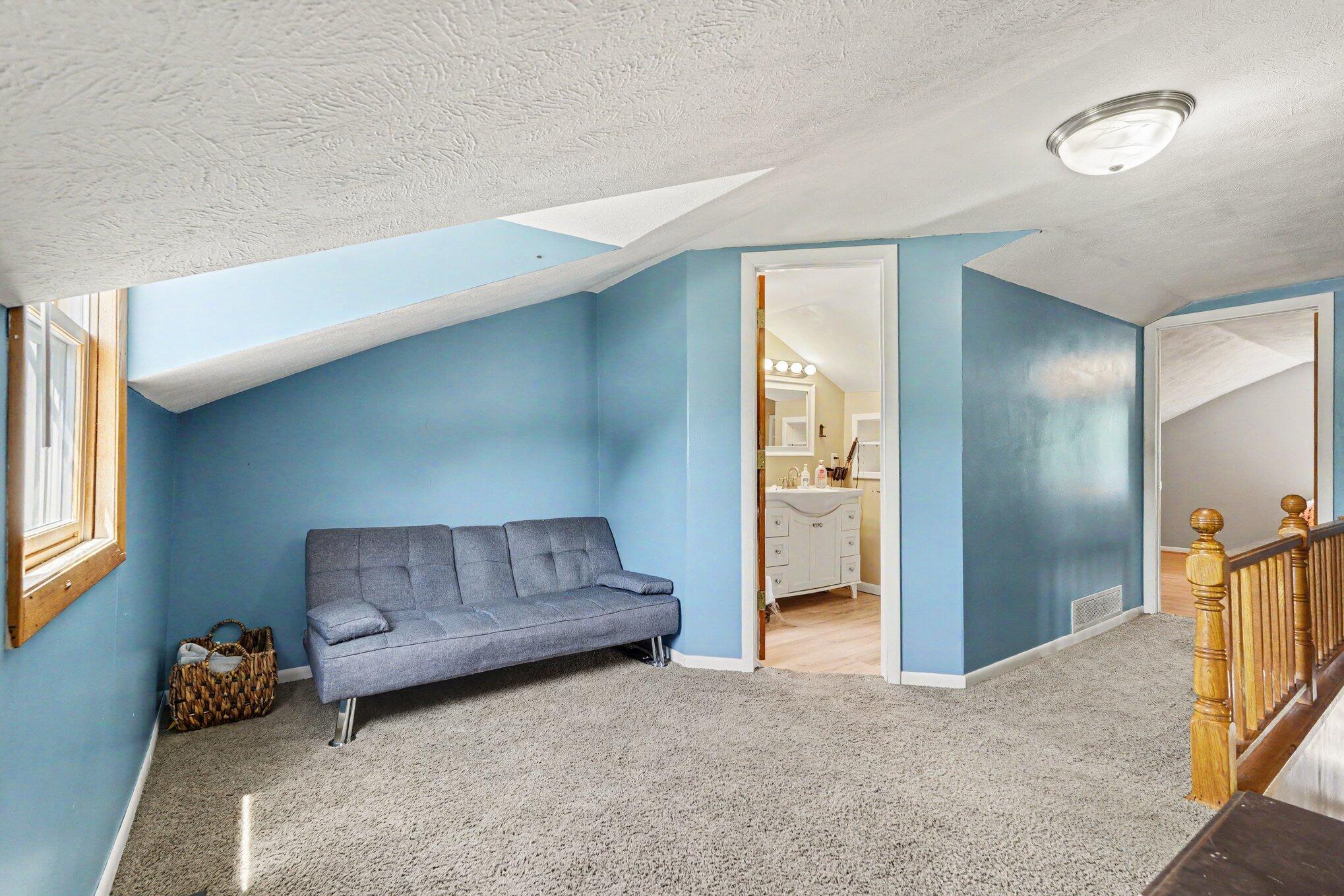 1721 Indian Lakes Road Northwest Kent City, MI 49330 - Photo 14 of 22 Upstairs Living Space