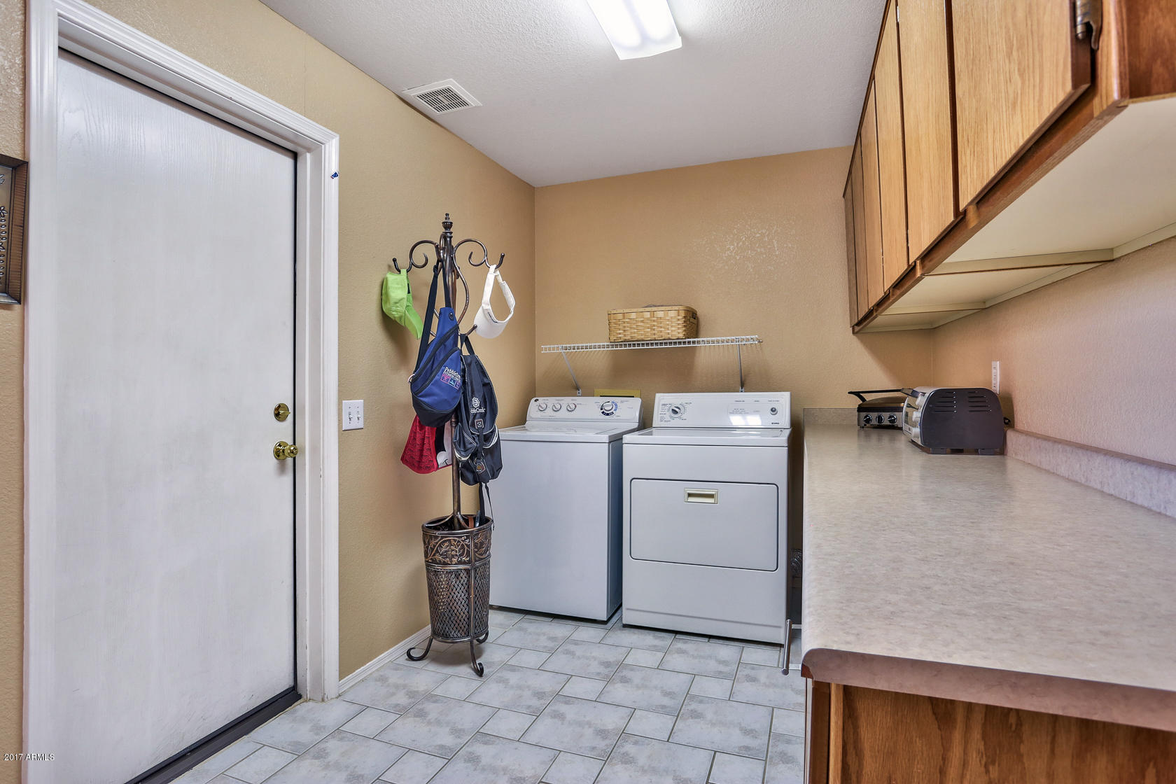 15804 Piccadilly Road Goodyear, AZ 85395 - Photo 11 of 13 15804 W Piccadilly Rd laundry