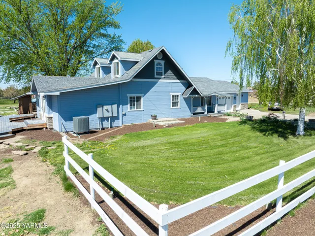 a view of a lake with a garden and lake view