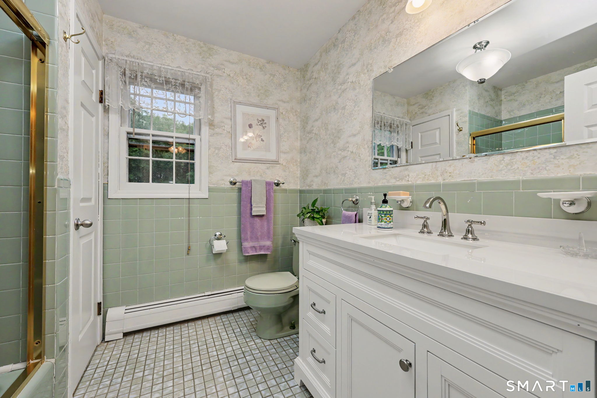571 Wheeler Road Monroe, CT 06468 - Photo 21 of 40 a bathroom with a sink toilet and shower