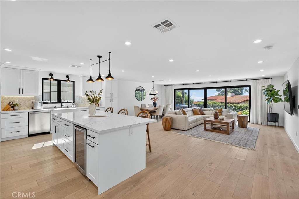 28405 Golden Meadow Drive Rancho Palos Verdes, CA 90275 - Photo 15 of 42 a large room with kitchen island a large window in it