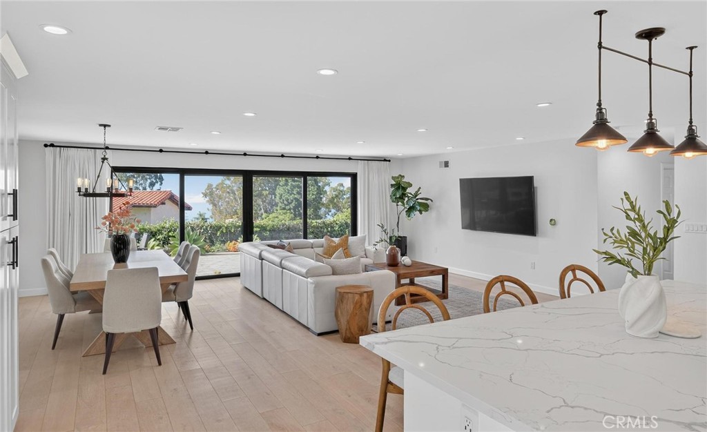 28405 Golden Meadow Drive Rancho Palos Verdes, CA 90275 - Photo 18 of 42 a living room with furniture and a floor to ceiling window