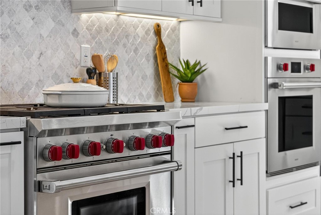 28405 Golden Meadow Drive Rancho Palos Verdes, CA 90275 - Photo 20 of 42 a utility room with sink and wooden floor