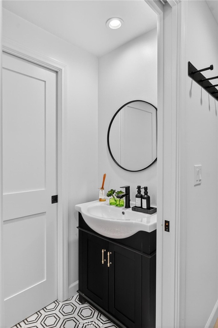 28405 Golden Meadow Drive Rancho Palos Verdes, CA 90275 - Photo 26 of 42 a bathroom with a sink and a mirror