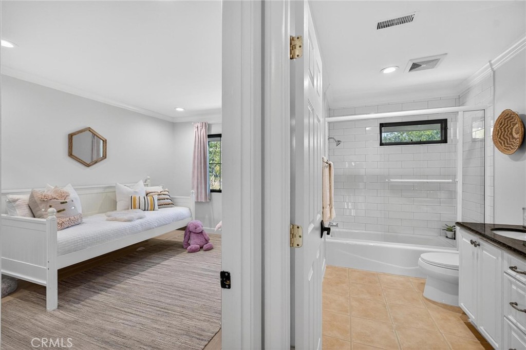 28405 Golden Meadow Drive Rancho Palos Verdes, CA 90275 - Photo 31 of 42 a bedroom with a bed and a view of bathroom