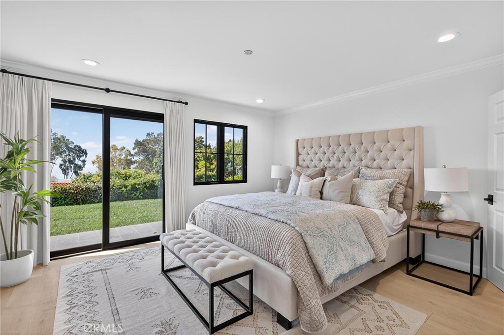28405 Golden Meadow Drive Rancho Palos Verdes, CA 90275 - Photo 35 of 42 a bedroom with a bed and a large window