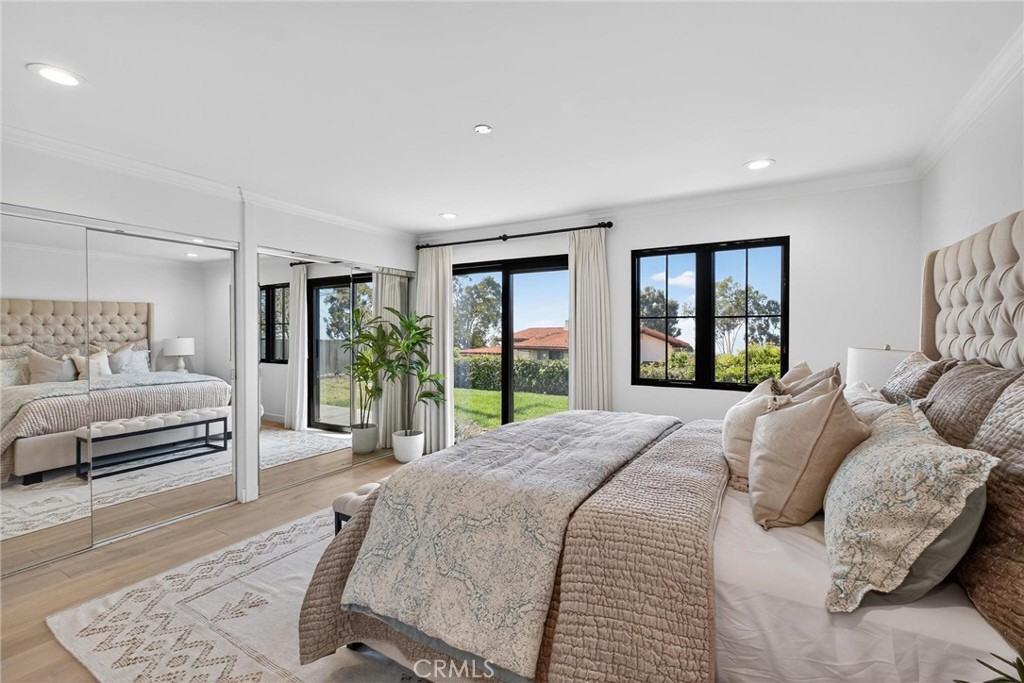 28405 Golden Meadow Drive Rancho Palos Verdes, CA 90275 - Photo 36 of 42 a bedroom with a large bed and a window