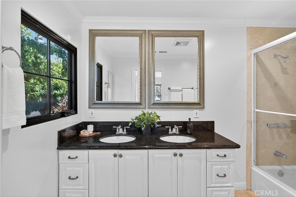 28405 Golden Meadow Drive Rancho Palos Verdes, CA 90275 - Photo 37 of 42 a bathroom with a sink and a mirror