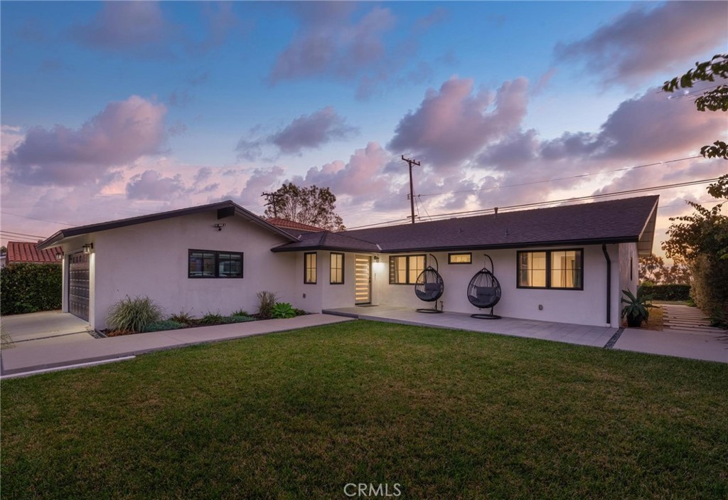 28405 Golden Meadow Drive Rancho Palos Verdes, CA 90275 - Photo 4 of 42 a front view of house with yard and garage