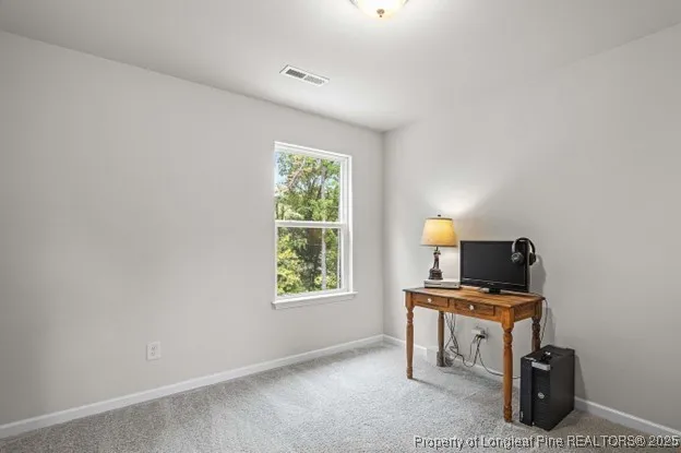 a room with furniture and a window