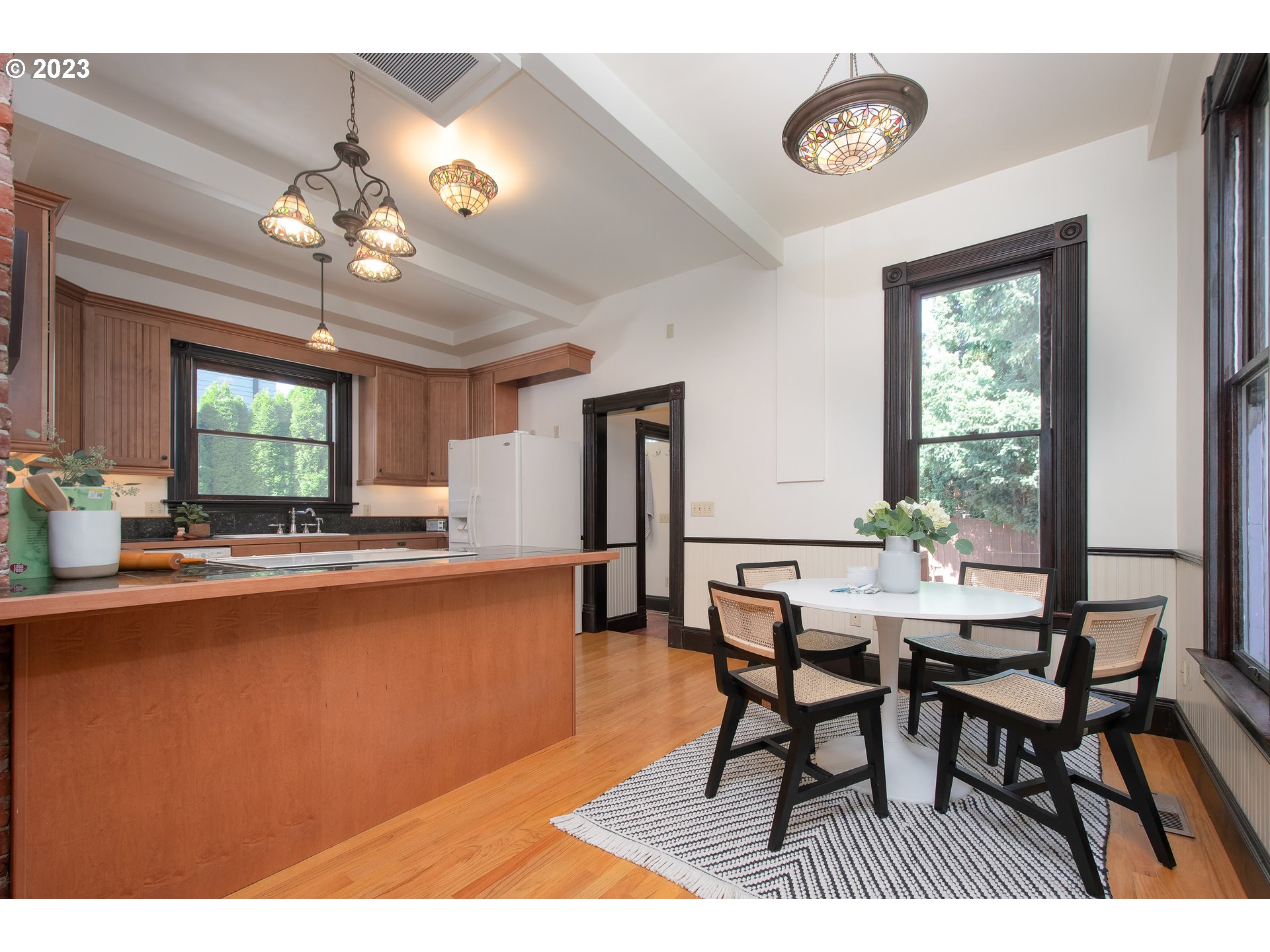 3519 Southeast Morrison Street Portland, OR 97214 - Photo 14 of 43 a view of a dining room with furniture window and outside view