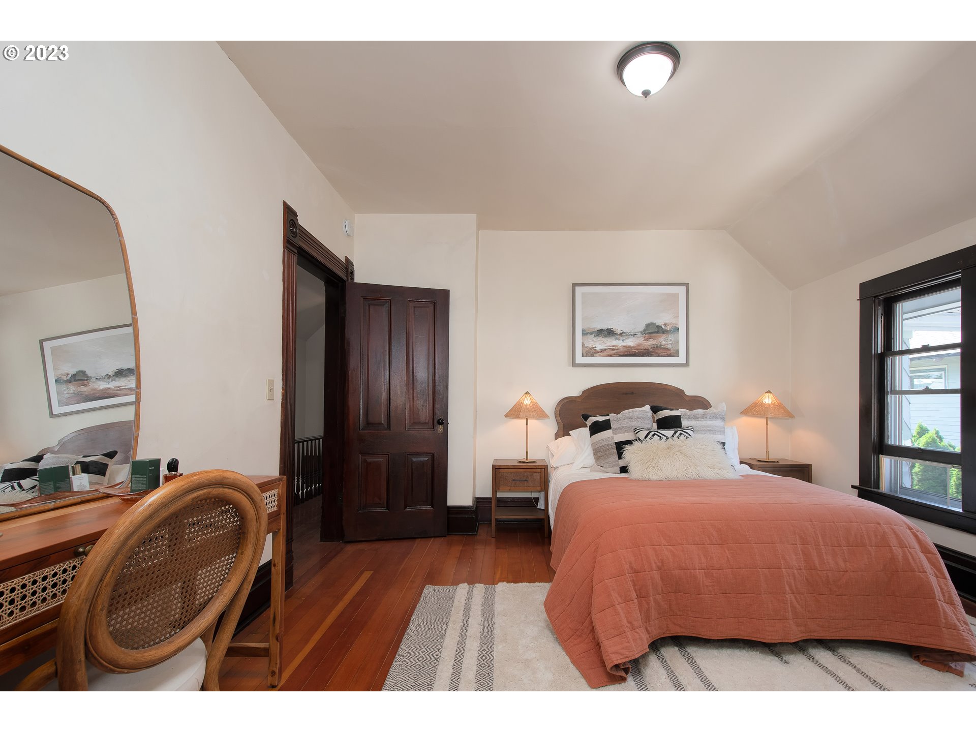 3519 Southeast Morrison Street Portland, OR 97214 - Photo 17 of 43 a bedroom with a bed and a dresser