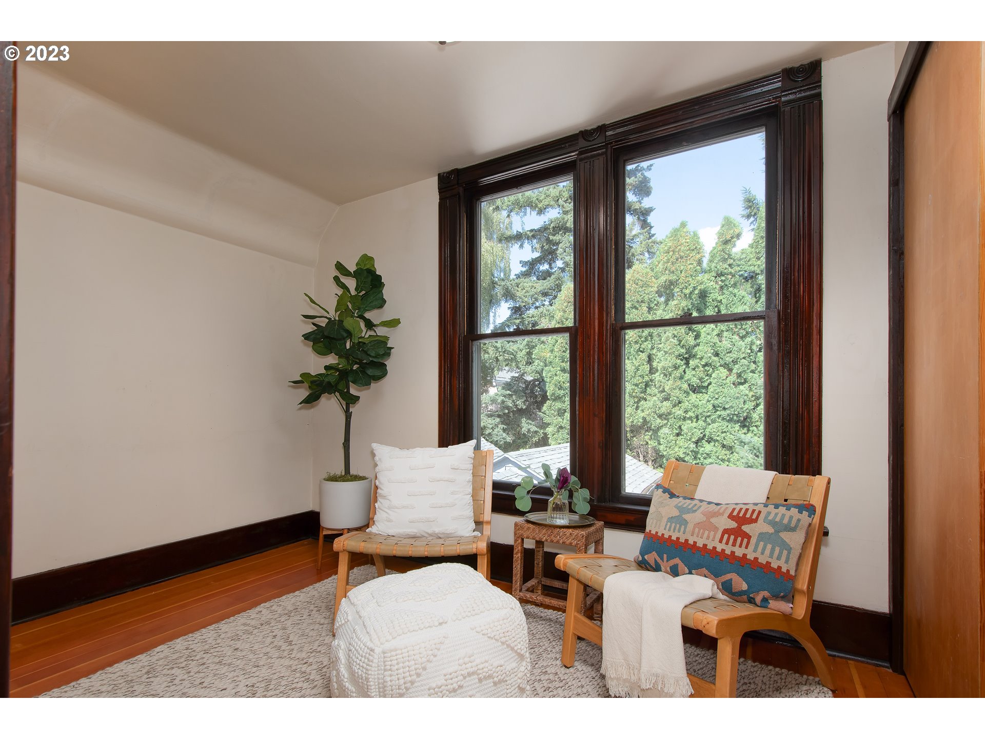 3519 Southeast Morrison Street Portland, OR 97214 - Photo 18 of 43 a outdoor living room with furniture and a potted plant