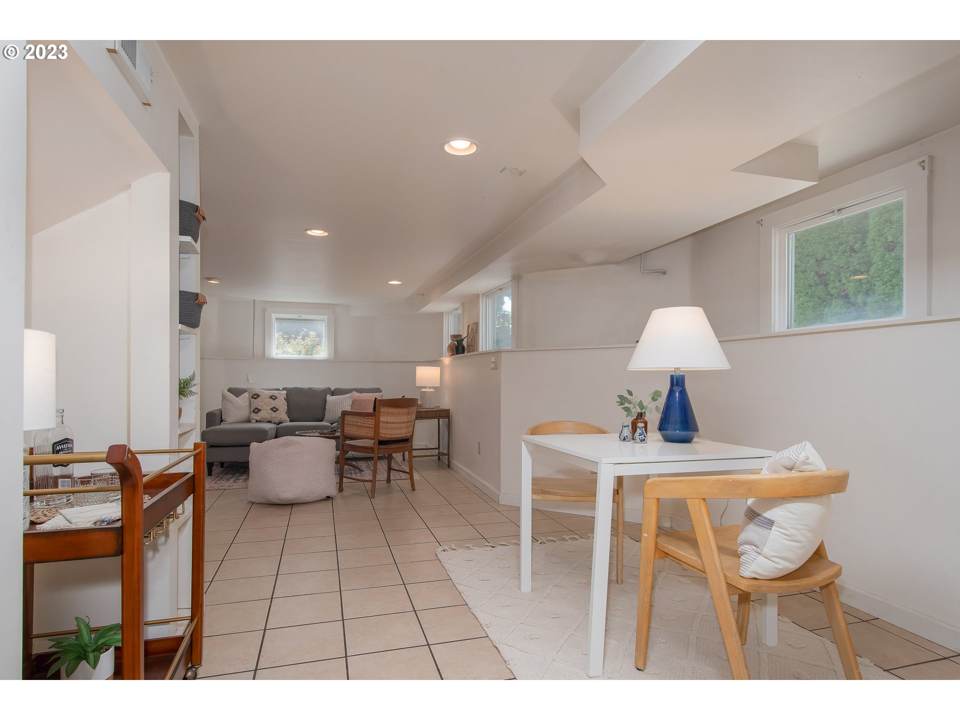 3519 Southeast Morrison Street Portland, OR 97214 - Photo 28 of 43 a living room with furniture a window and a table