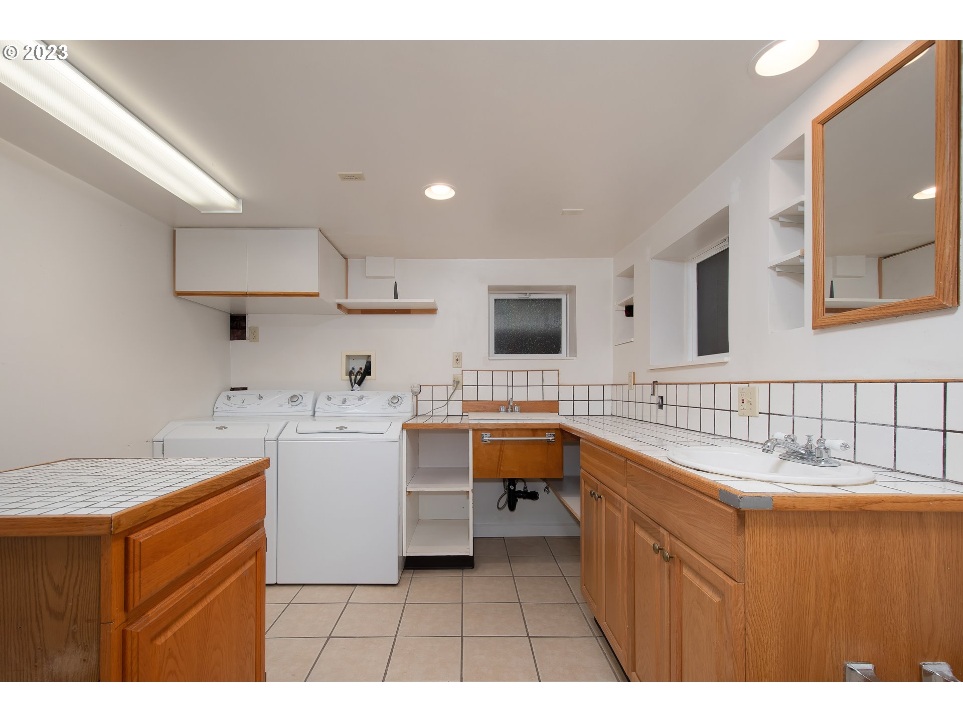 3519 Southeast Morrison Street Portland, OR 97214 - Photo 30 of 43 a kitchen with a sink stove and cabinets
