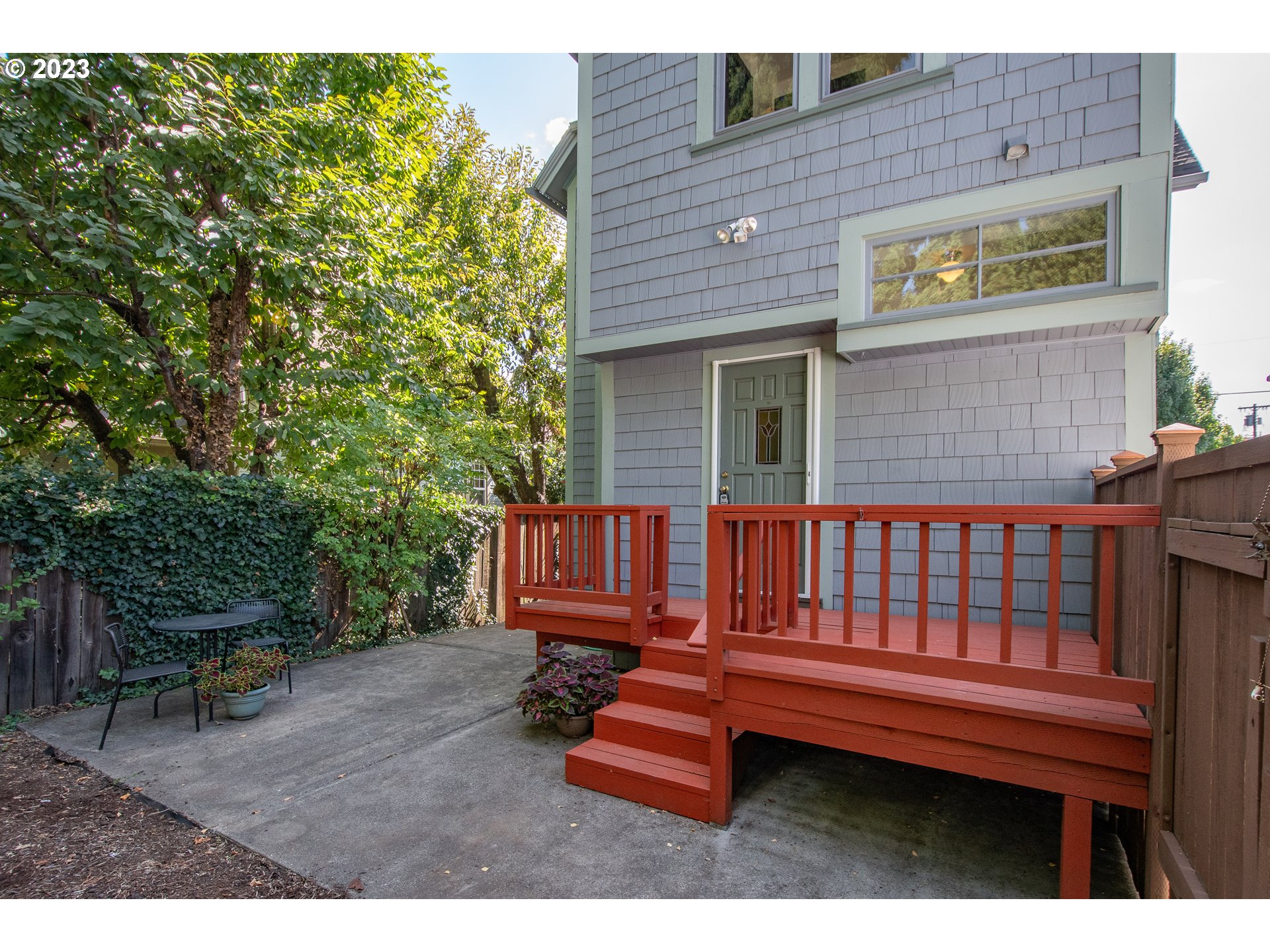 3519 Southeast Morrison Street Portland, OR 97214 - Photo 32 of 43 a view of a wooden bench sitting in backyard