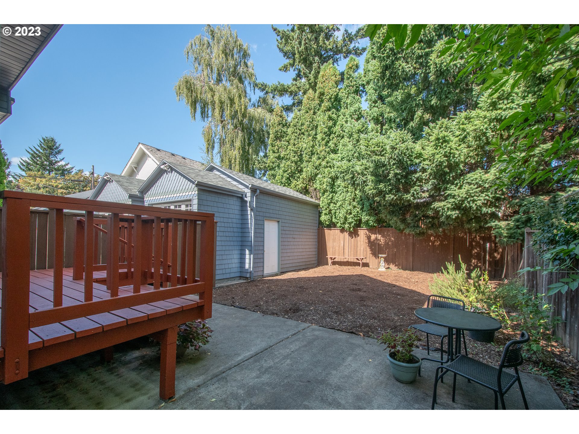 3519 Southeast Morrison Street Portland, OR 97214 - Photo 34 of 43 a view of a backyard with a sitting area