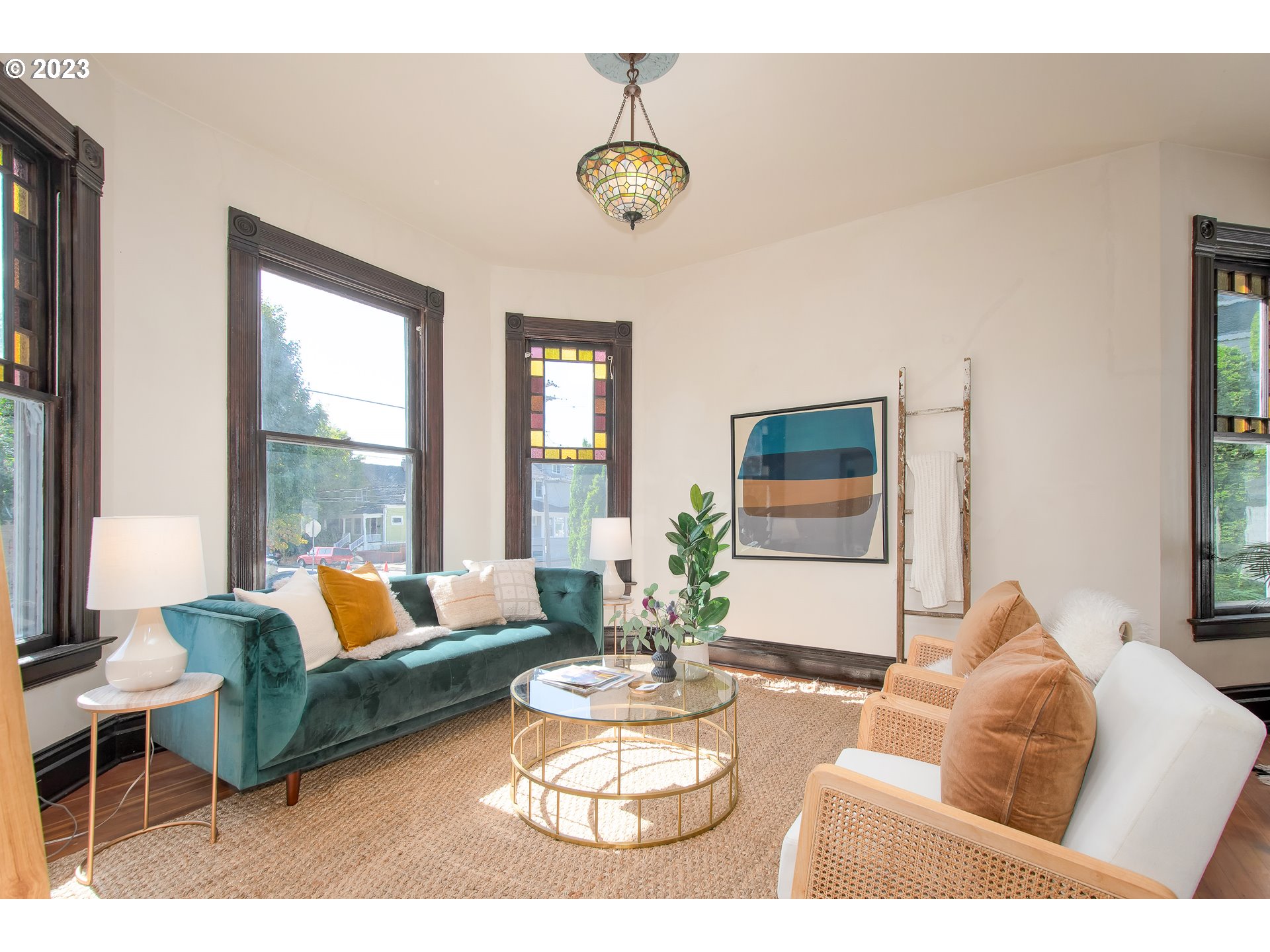 3519 Southeast Morrison Street Portland, OR 97214 - Photo 4 of 43 a living room with furniture and a large window