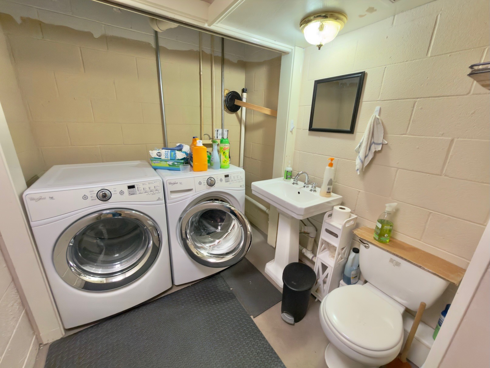 3080 Pleasant Ridge Road Woodbury, TN 37190 - Photo 18 of 19 a white toilet sitting next to a bathroom sink
