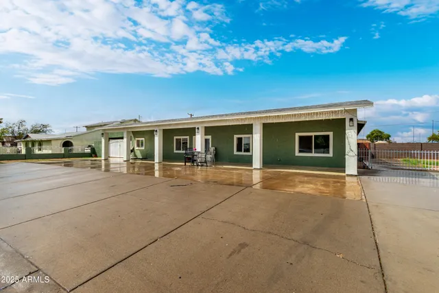 a view of a house with entertaining space