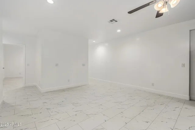 a view of a kitchen with a sink and a cabinets