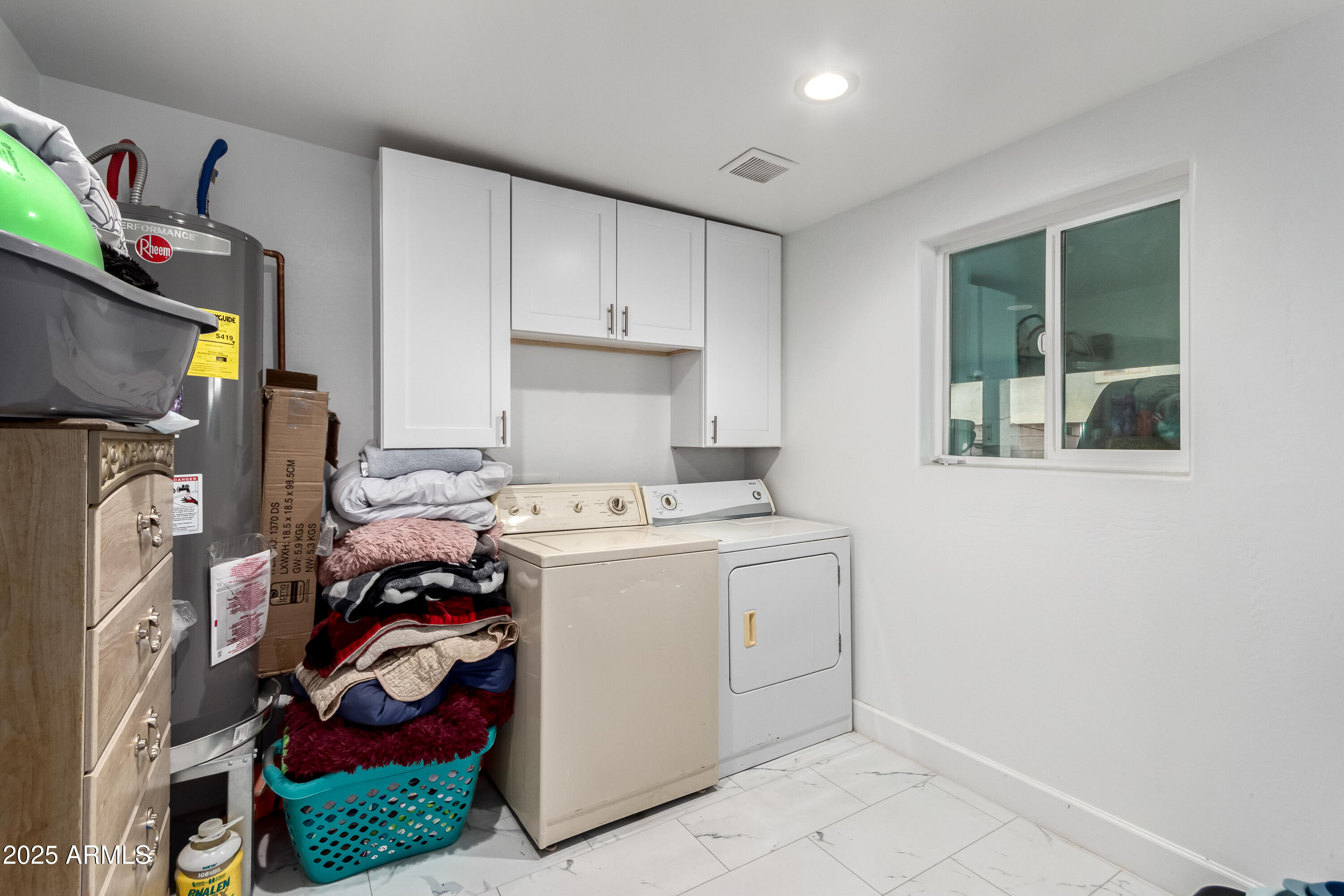 15640 North Verde Street Surprise, AZ 85378 - Photo 46 of 56 a view of a kitchen with fridge and workspace