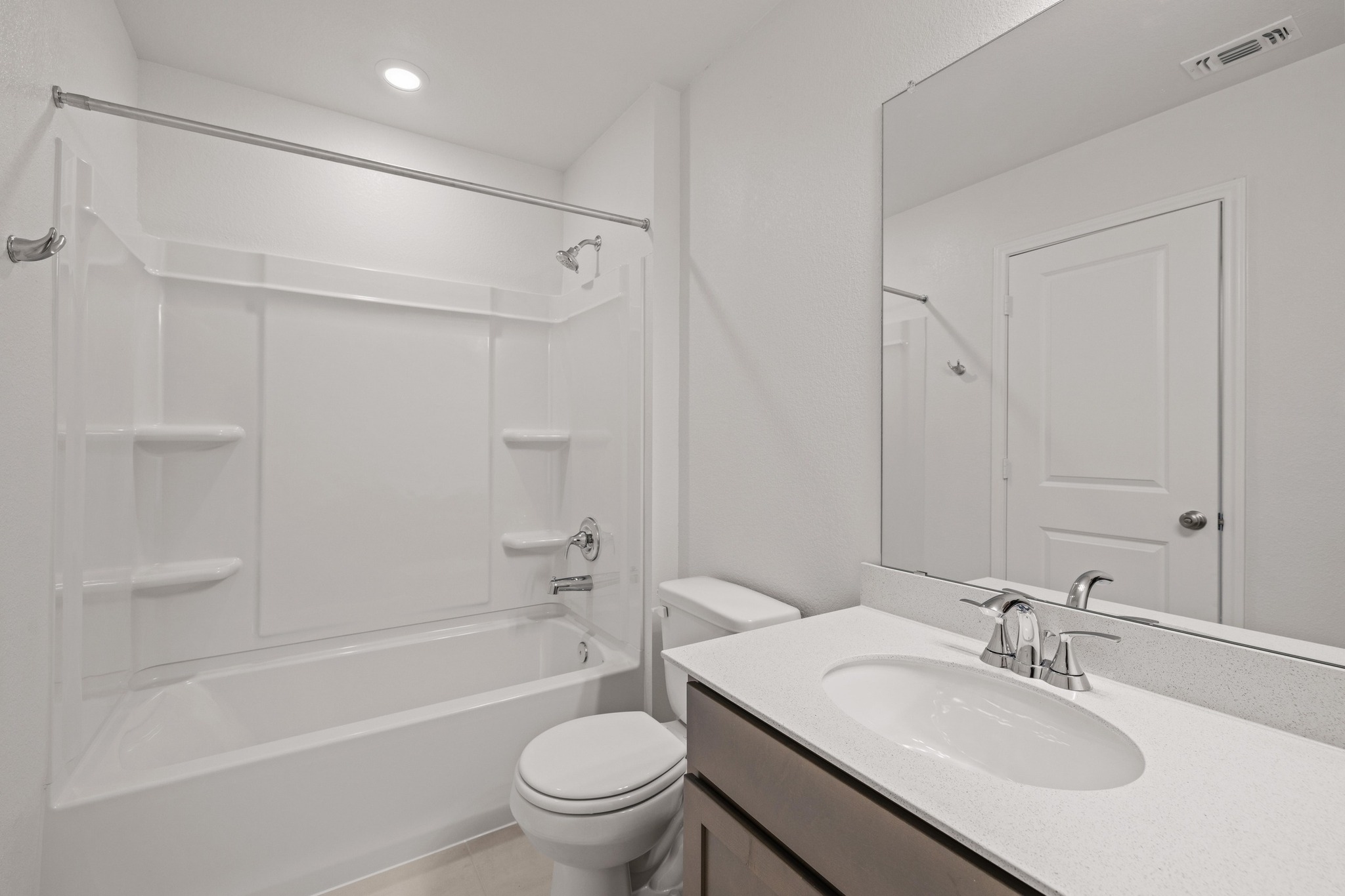 161 Lucky Texan Road Jarrell, TX 76537 - Photo 25 of 32 a bathroom with a sink toilet and a bathtub