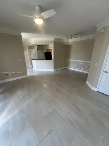 a view of a kitchen with a sink
