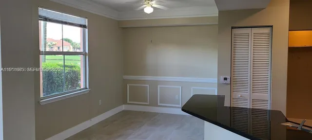 a bathroom with a bath tub with a shower