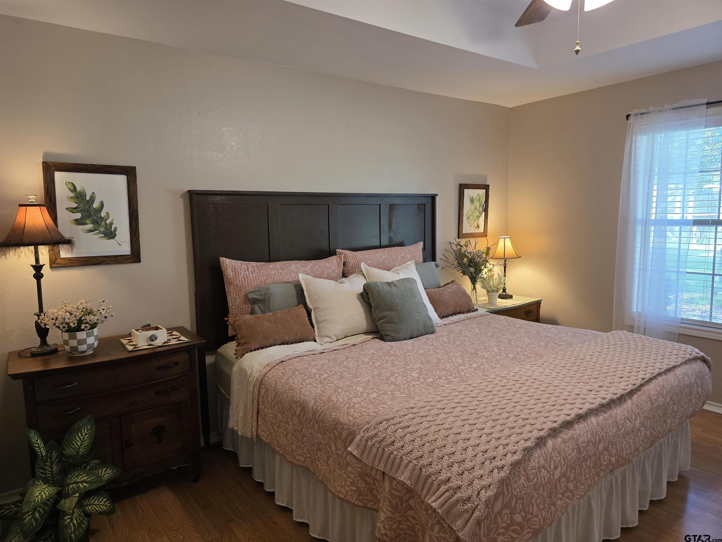6170 Highway 271 Mount Pleasant, TX 75455 - Photo 20 of 43 a bedroom with a bed and window