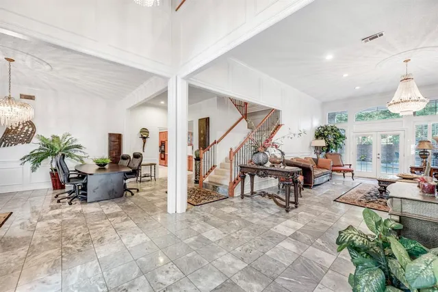 a view of a living room and entryway