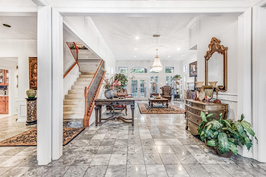 7204 Debbe Drive Dallas, TX 75252 - Photo 12 of 40 a view of a living room and entryway