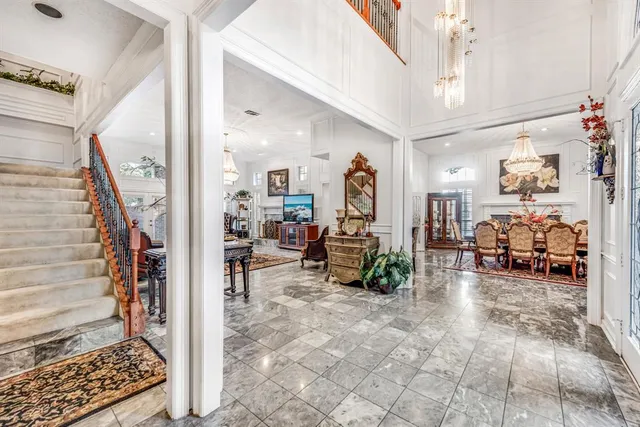 a kitchen with stainless steel appliances granite countertop a sink counter space and a stove top oven